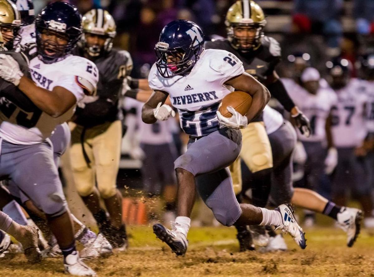 Newberry running back Amir Abrams (22) finds room to run this past season against Fairfield Central.