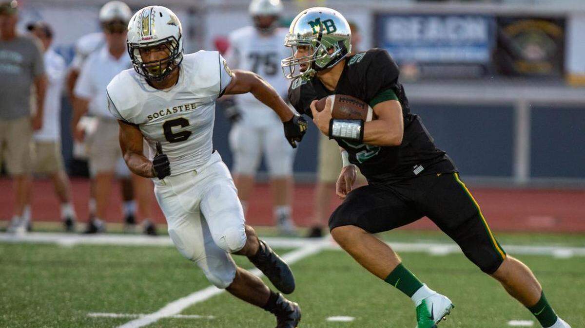 Myrtle Beach Seahawks junior quarterback Luke Doty runs the ball against the Socastee Braves Friday night at Doug Shaw Memorial Stadium.