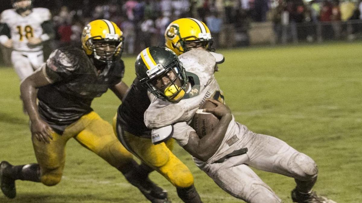 Myrtle Beach’s Jermani Green cuts back to gain extra yards against Conway on Friday