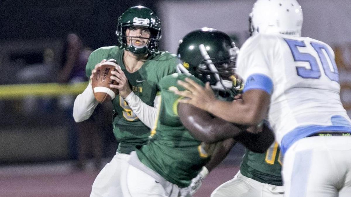 Myrtle Beach’s Luke Doty looks for a receiver at the 2018 CNB Kickoff Classic. Aug., 10 2018.