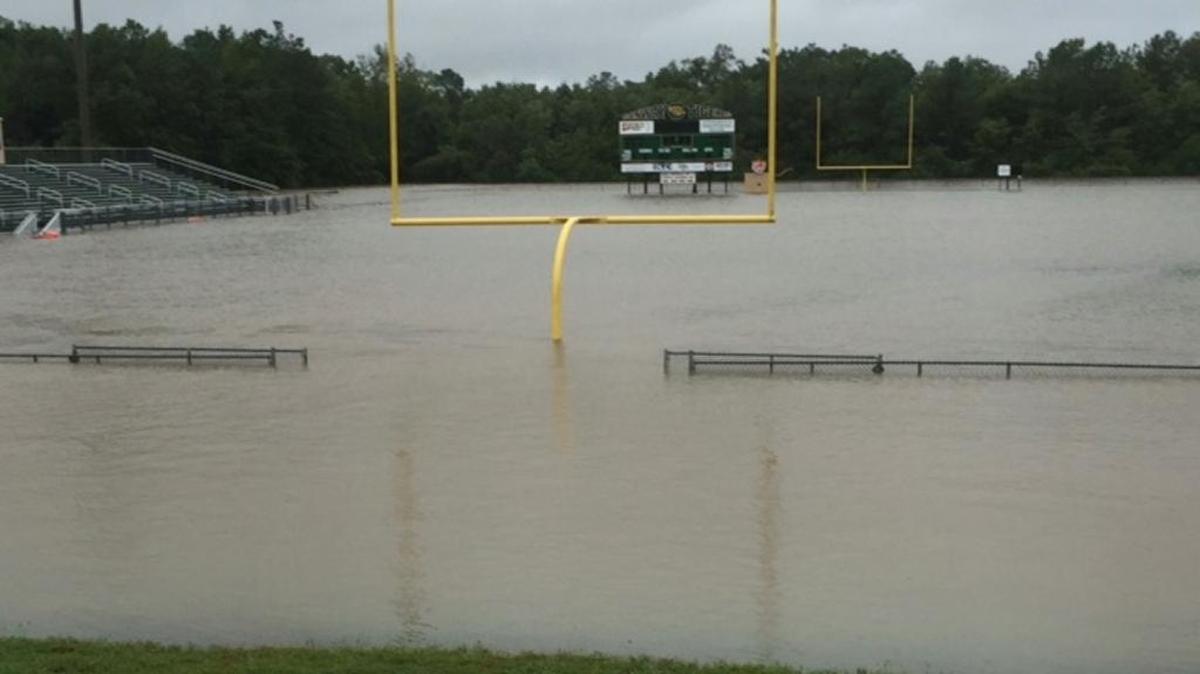 
Conway’s football field is shown underwater because of severe flooding Sunday.

