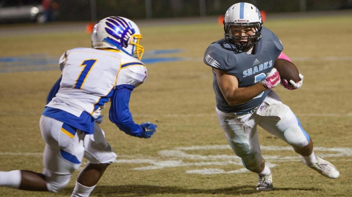 St. James’ Jackson Hurston eyes up North Myrtle Beach’s Mike Gore during Friday’s game.