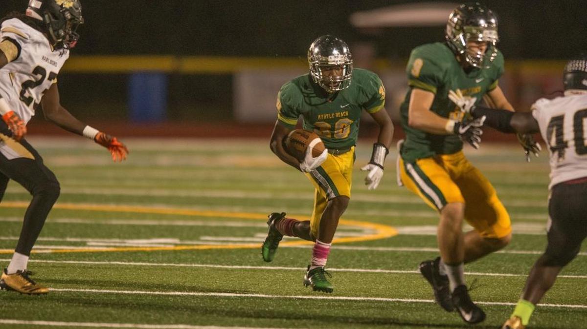Myrtle Beach’s Jaylen Sparkman looks for running room against Marlboro County on Friday.