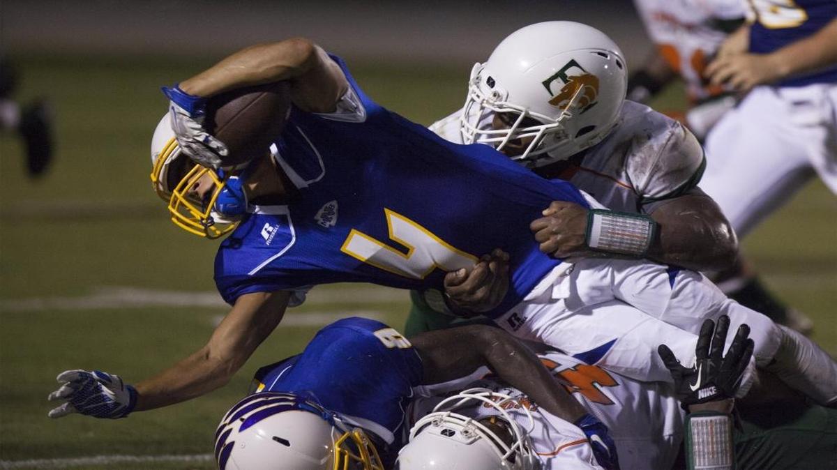 North Myrtle Beach running back Kered Class stretches for extra yardage during second quarter action against Timberland Friday night.