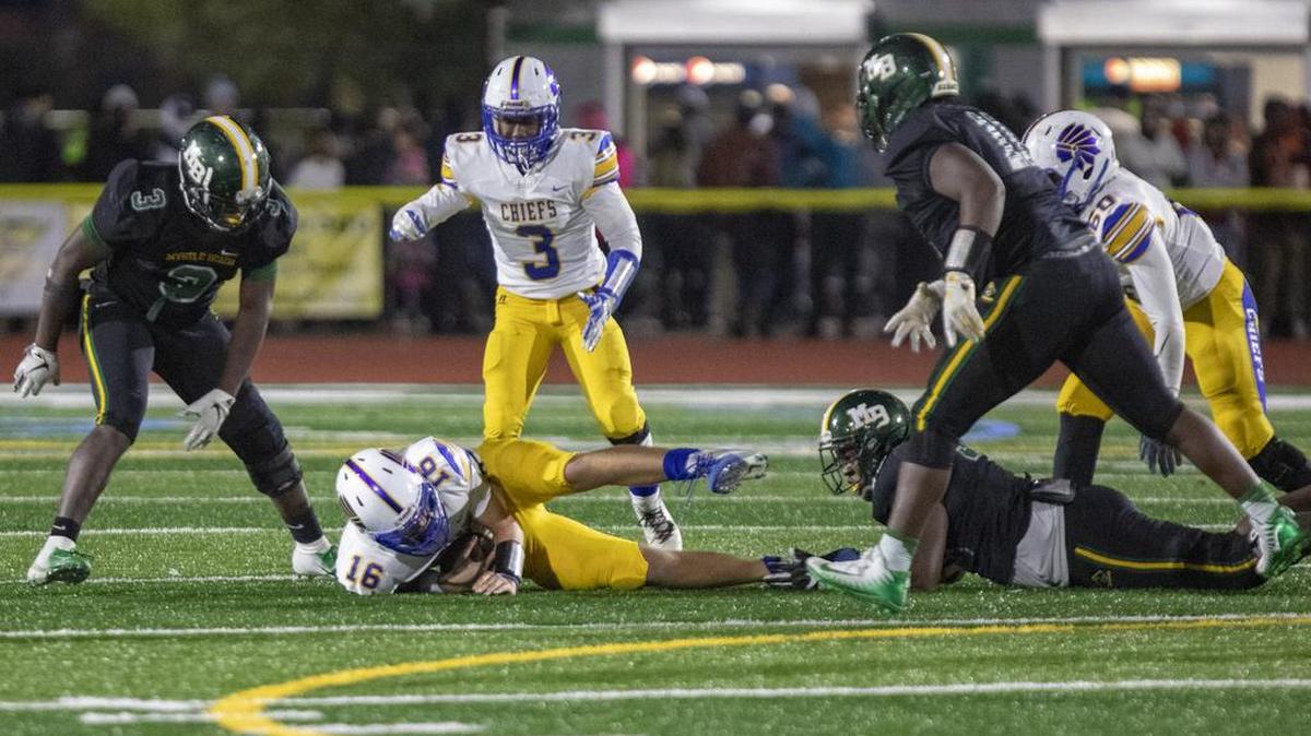 Myrtle Beach senior defensive lineman J.B. Favorite sacks North Myrtle Beach senior quarterback Cason McClendon Friday night at Doug Shaw Memorial Stadium.
