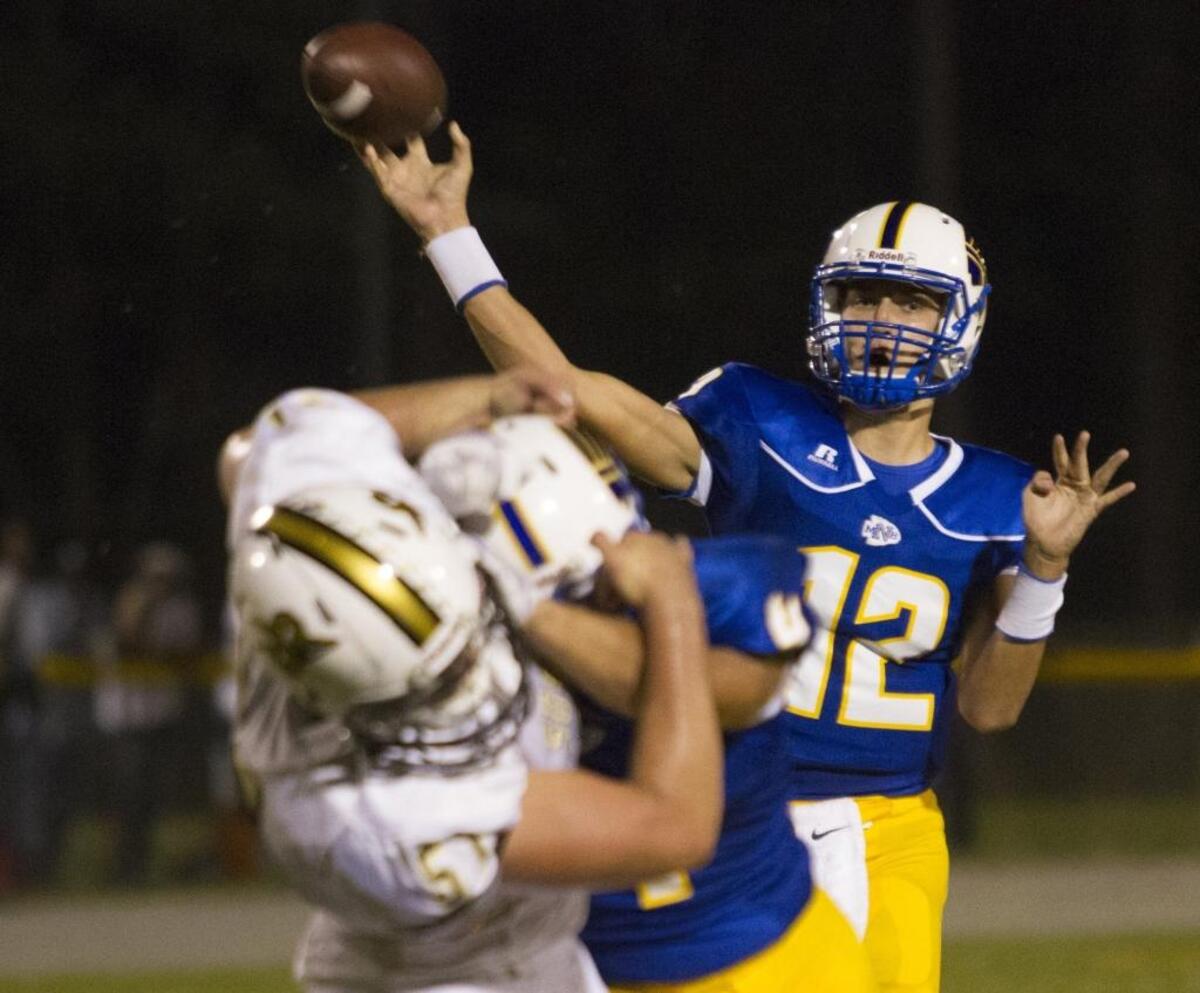 North Myrtle Beach quarterback Cason McClendon lofts a pass toward a receiver in the Chiefs’ win over Socastee a few weeks ago.