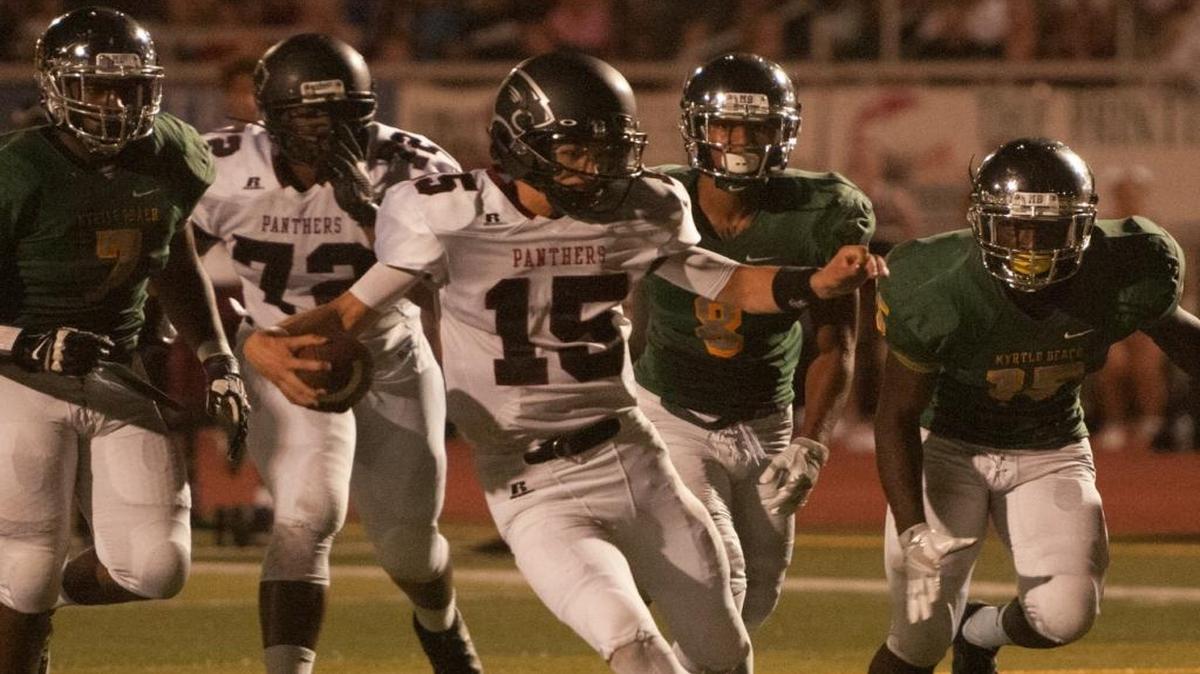 Carolina Forest quarterback Matt Beale finds space to run Friday night against Myrtle Beach.