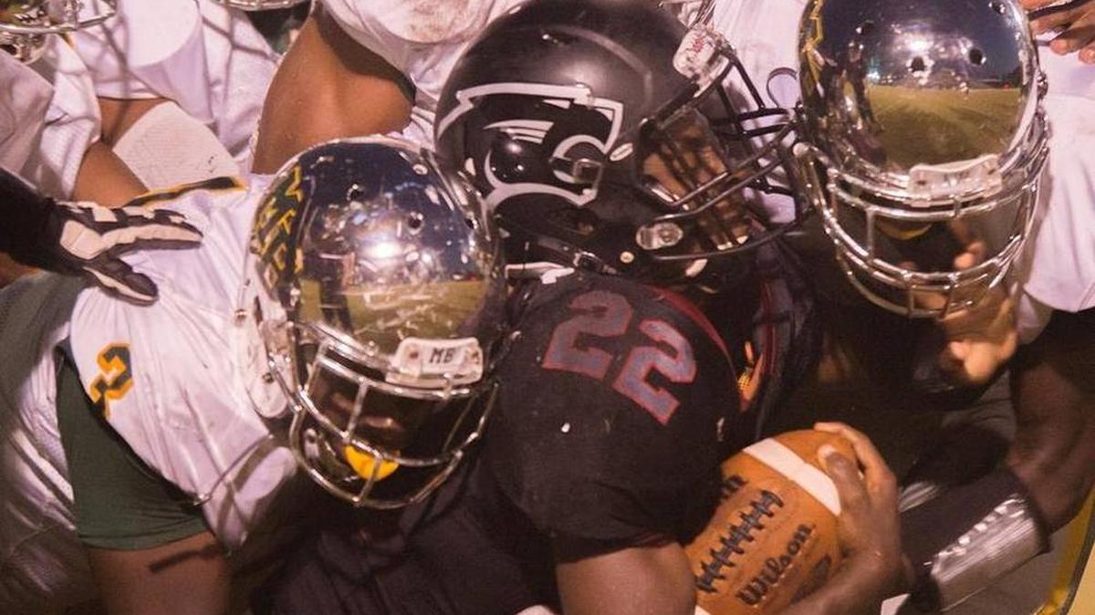 Myrtle Beach tacklers corral a Carolina Forest ball carrier this past Friday night/