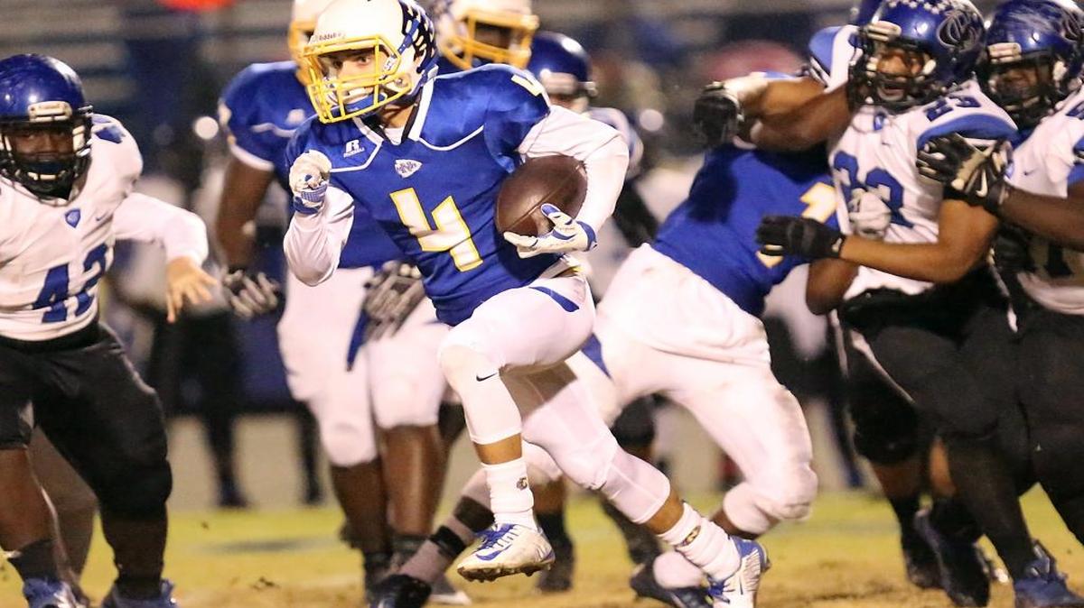North Myrtle Beach running back Kered Class finds running room during the Chiefs’ playoff game last November against Cane Bay.