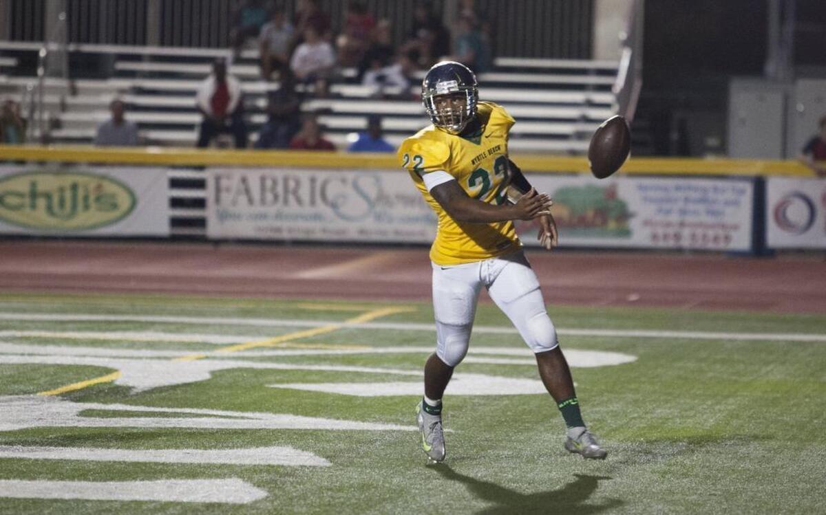 
Myrtle Beach’s Brandon Sinclair (22) flips the ball after scoring against Carolina Forest on Friday.
