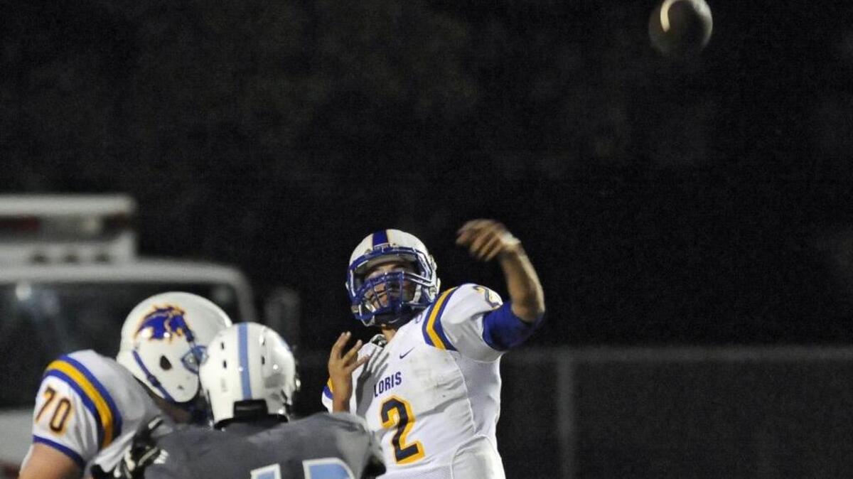 
Loris’ Ta’Jay Williams makes a pass against St. James last week.
