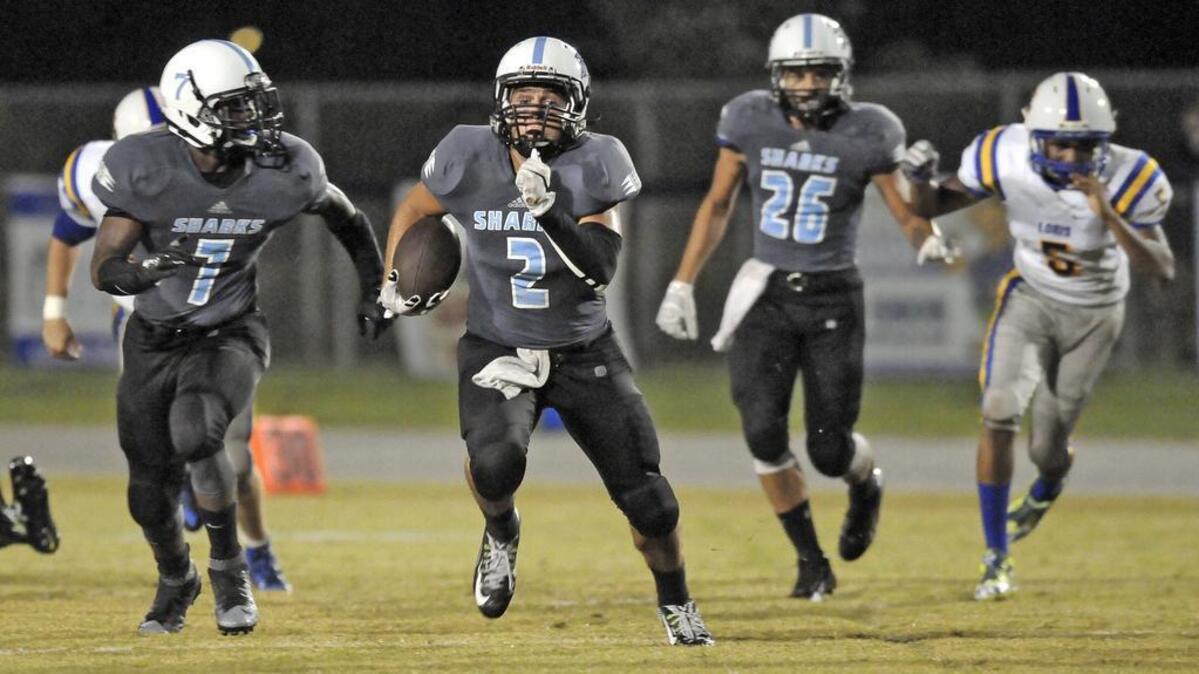 
St. James’ Jackson Hurston carries the ball during Friday’s win over Loris.
