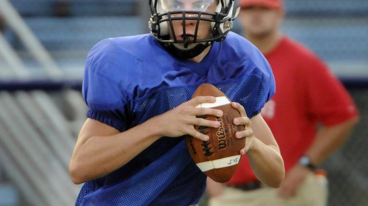 
St. James quarterback Zach Werba looks for an open receiver during a scrimmage against Waccamaw.
