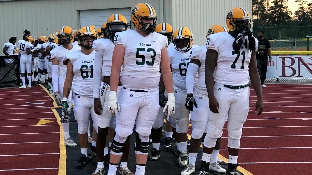 Conway offensive linemen Gunner Britton (left) and Raiqwon O’Neal will take part in Saturday’s Shrine Bowl of the Carolinas.