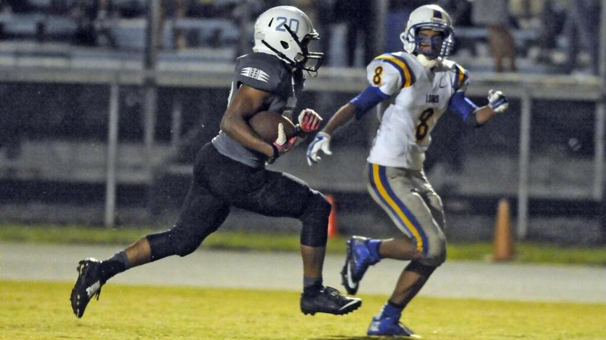 
Loris’ Hakeem Jackson (right) tries to cut off St. James’ Jay-Mion Pressley during Friday’s game.
