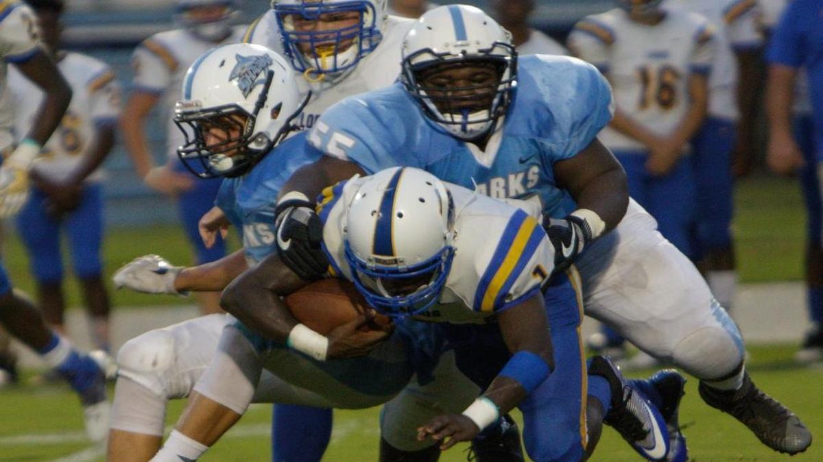 Loris’ Kendall Goodson dives for the line of scrimmage against St. James on Friday night.
