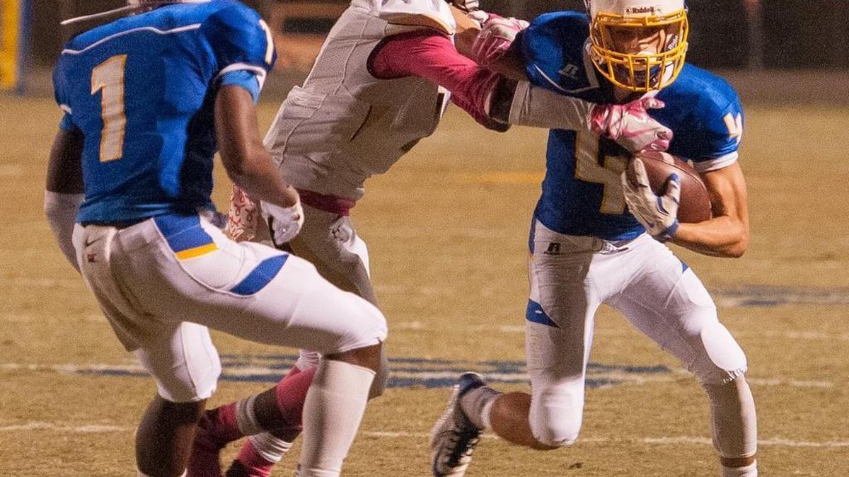 North Myrtle Beach running back Kered Class tries to create some space during a run last season.