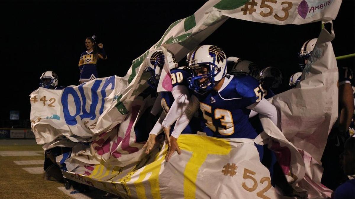 North Myrtle Beach lineman Nate McDaniel (53) leads the Chiefs onto the field before action with St. James Friday night at North Myrtle Beach High School.