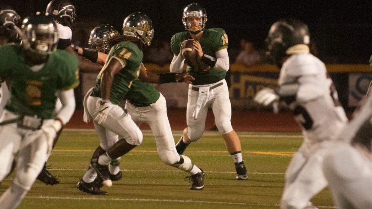 Myrtle Beach’s Lawson Cribb scans the Carolina Forest defense Friday night.