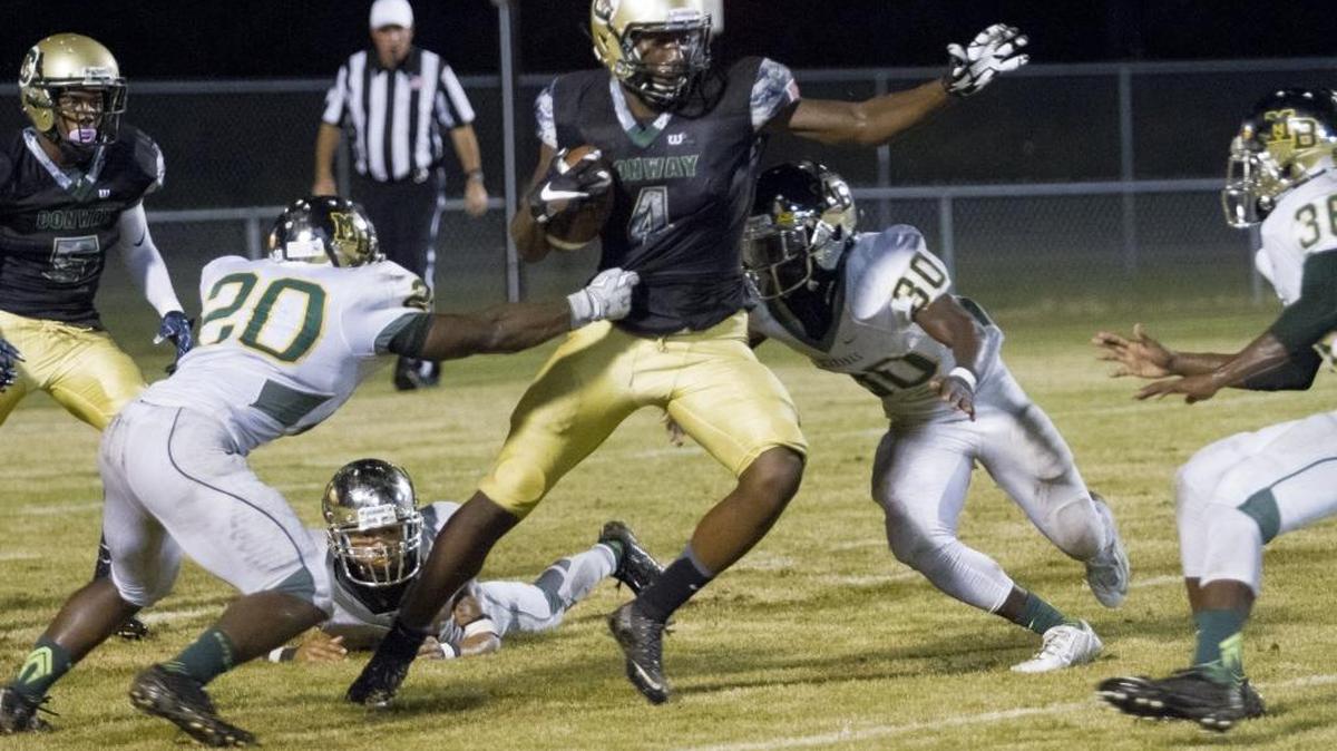 Conway's Bryan Edwards is teamed up on by Myrtle Beach defenders earlier this season.