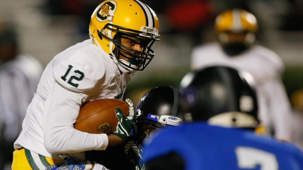 Conway’s Darren Stanley tries to avoid a tackle during Friday’s game against Fort Dorchester.
