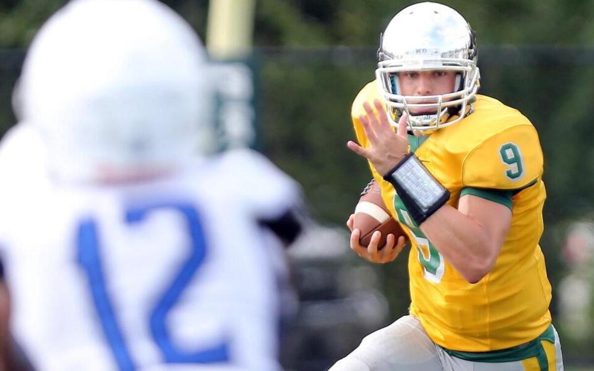 Myrtle Beach quarterback Luke Doty looks for room to run during Friday’s game against Charlotte (N.C.) Christian.