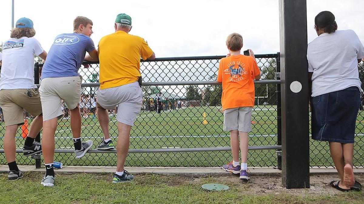 Myrtle Beach Seahawks play Charlotte Christian Academy at Ashley Booth Field on Friday, Aug. 25, 2017, as work is being complete on Doug Shaw Stadium. Fans filled the two bleachers and several watched the game from the softball and baseball fields surrounding Ashley Booth.