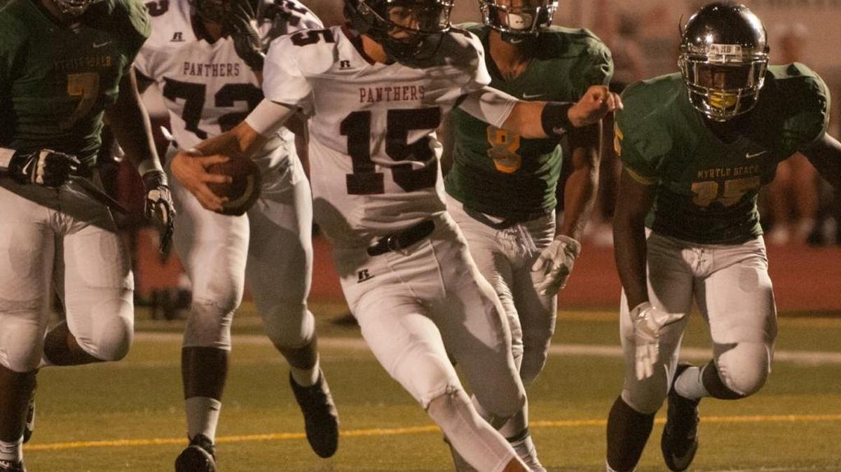 Carolina Forest quarterback Matt Beale finds room to run during last year’s matchup with Myrtle Beach.