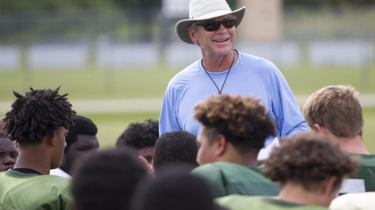 
Conway coach Chuck Jordan talks to his players ahead of this year’s game against Myrtle Beach.
