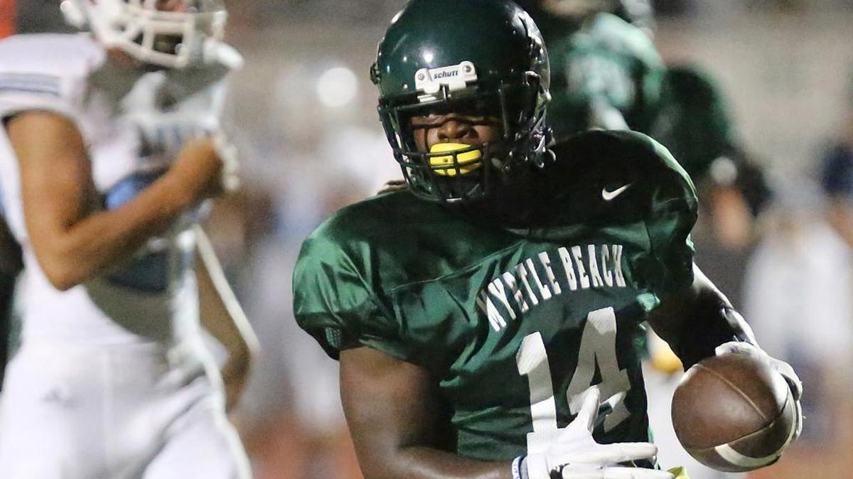Myrtle Beach’s Keyonte Sessions scores during last week’s CNB Kickoff Classic.