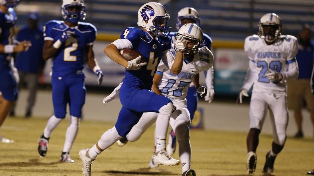 North Myrtle Beach running back Kered Class (4) finds a hole to run through the St. James defense during a game this past season.