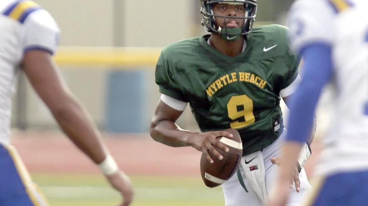 
Myrtle Beach quarterback Drayton Arnold scrambles during a recent scrimmage against Loris at Doug Shaw Stadium.
