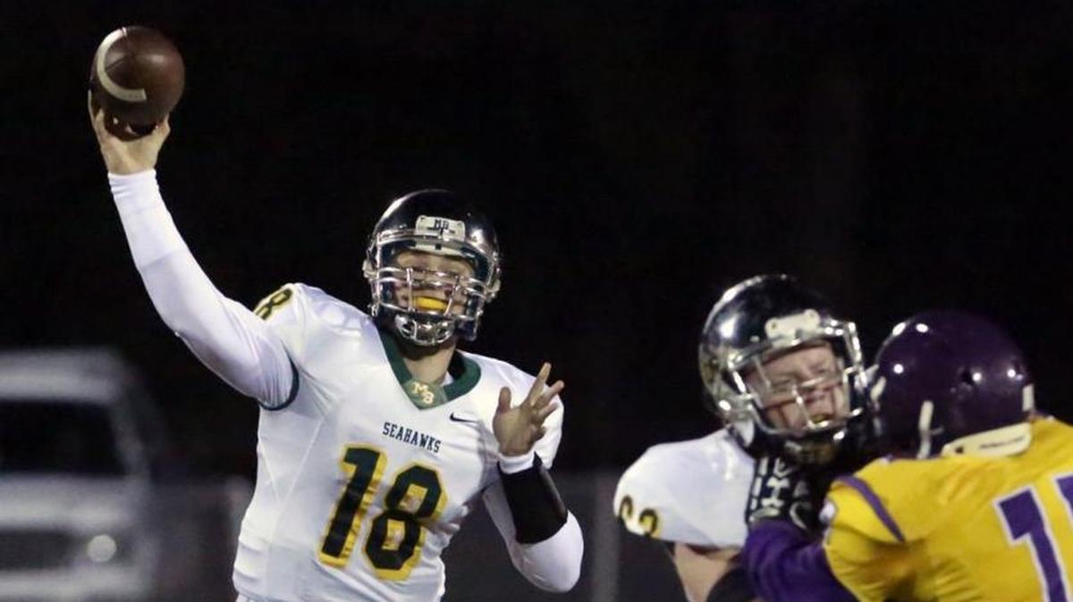 Myrtle Beach quarterback Lawson Cribb fires a pass toward a receiver on Thursday night in the Seahawks’ win over Wilson.