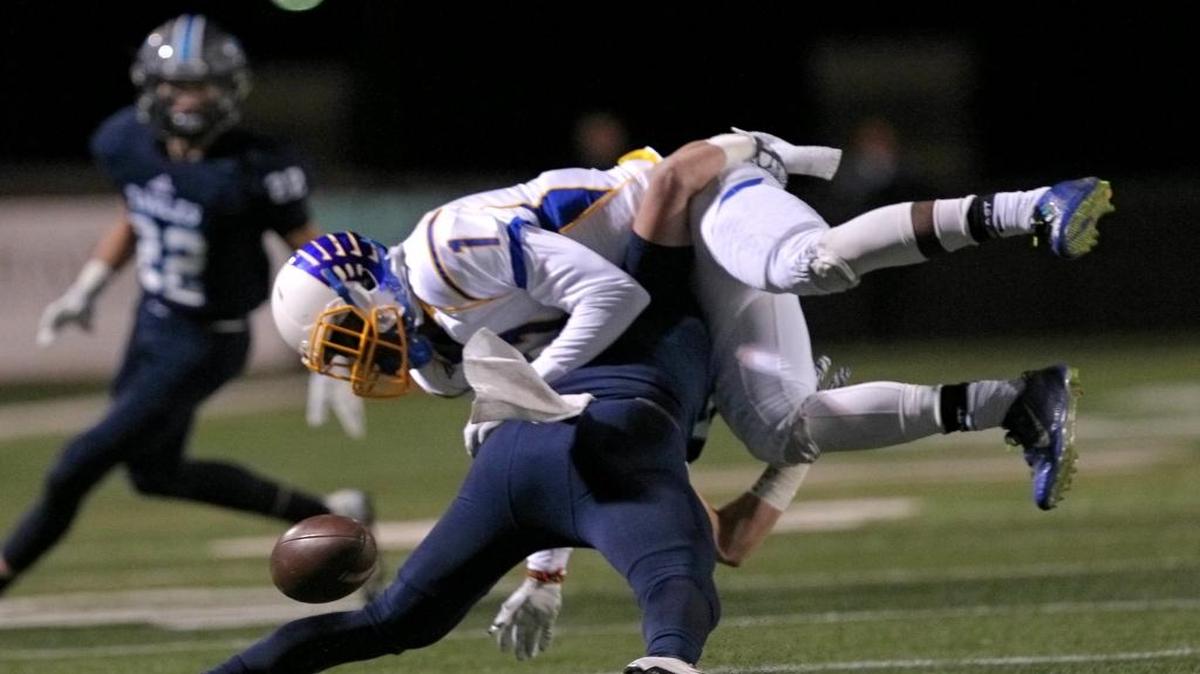Chapin’s Will Kroske (7) breaks up a pass intended for North Myrtle Beach’s Xavier Clarida (1) during a Class AAAA Lower State playoff game.