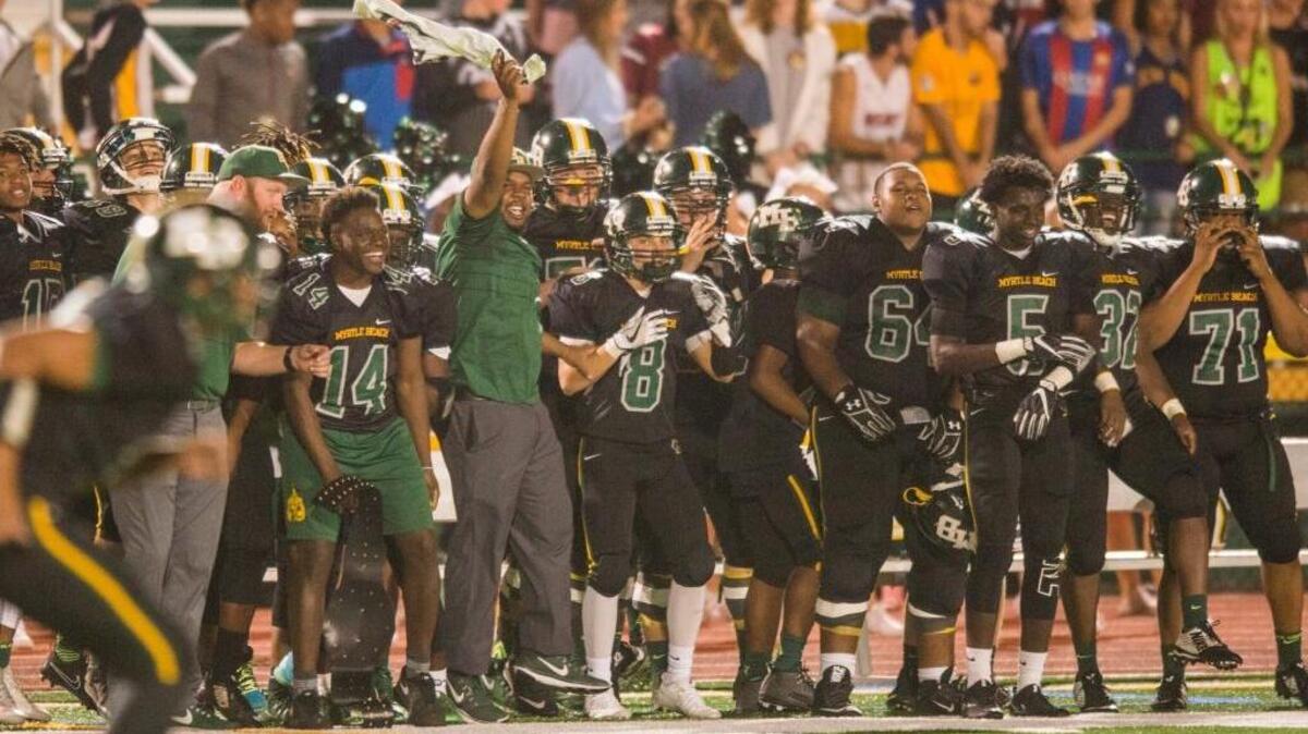 Myrtle Beach players cheer on teammates during Friday night’s game against Beaufort.