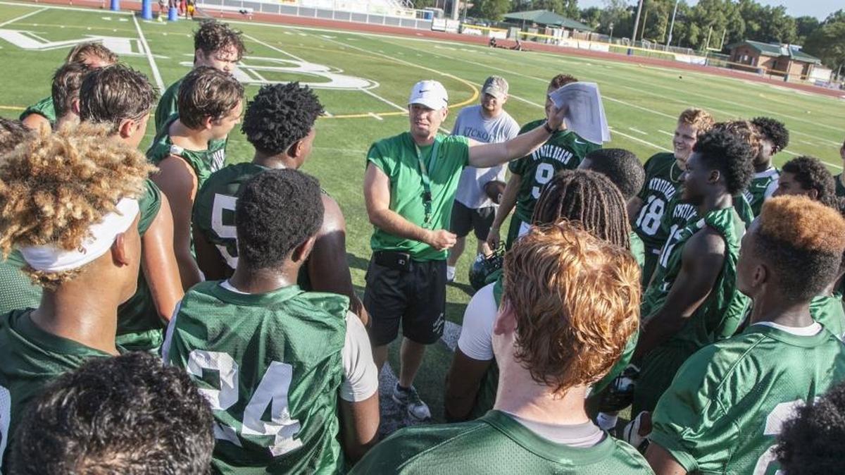 Myrtle Beach coach Mickey Wilson talks to his players during a recent practice.