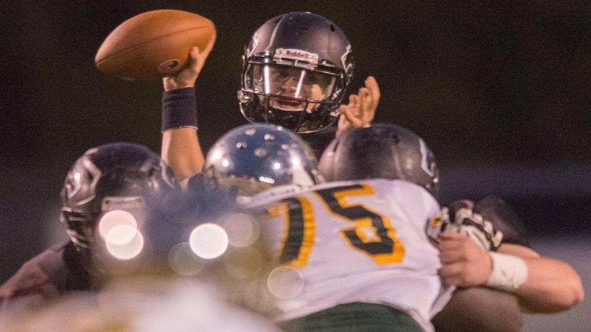 Carolina Forest quarterback Matt Beale prepares to fire a pass toward his intended target during last Friday’s game against Myrtle Beach.
