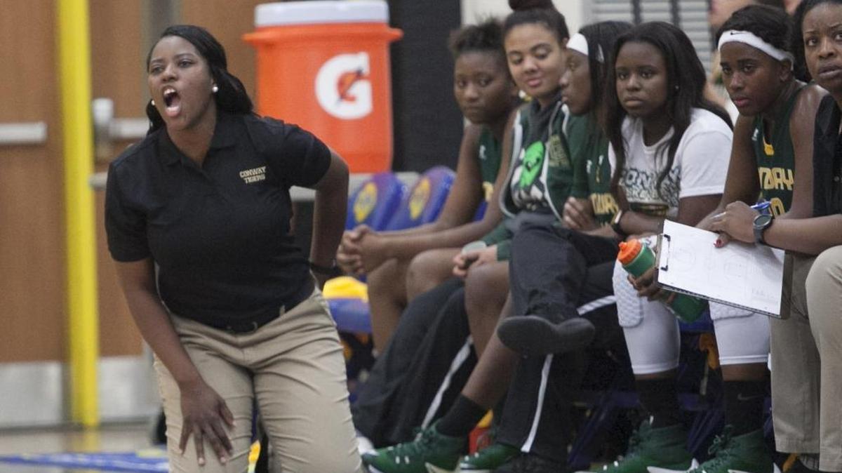 Conway coach Shamae Hemingway yells instructions to her players during a game last season.