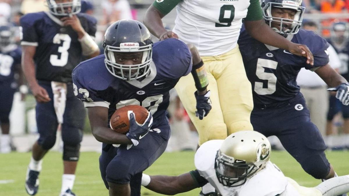 Georgetown’s Deakidd Anderson breaks the tackle of Conway’s Jerron Bellamy during a game last season. The Bulldogs will have a new leader at the helm next season, with current Georgetown assistant and former Hemingway coach Ken Cribb the likely candidate for the position.