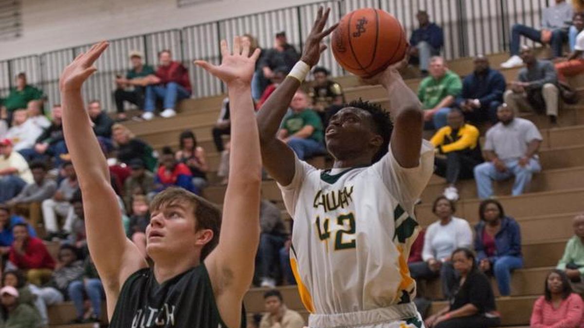Conway’s Jimmy Nichols rises for a jumper this past season during a game with Dutch Fork.