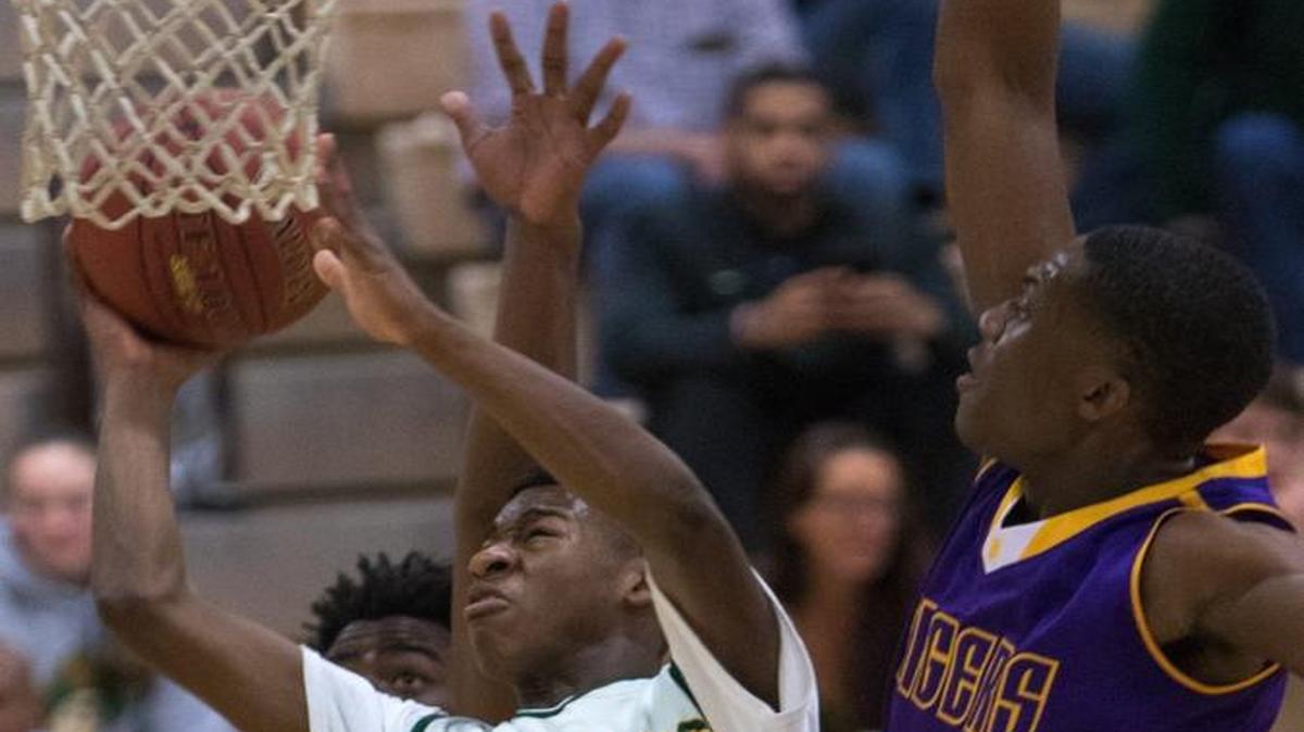 Myrtle Beach’s Jay Trappier goes up for a shot against Wilson on Friday.