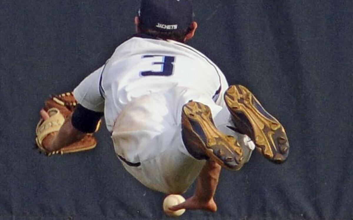 
This fly ball gets past Aynor outfielder Jackson Woodle during their first game against Edisto on Wednesday.

