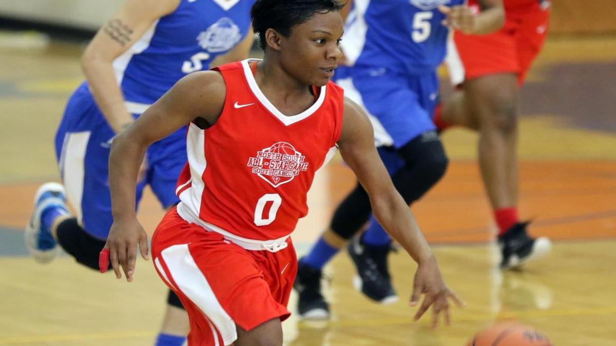 Myrtle Beach’s Keocia Walker dribbles up the floor during the North-South game Saturday.