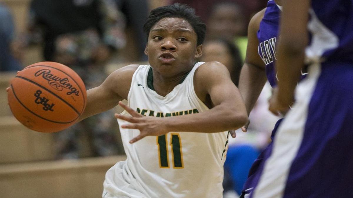 Myrtle Beach guard Keocia Walker drives the ball past Crestwood defenders Monday.