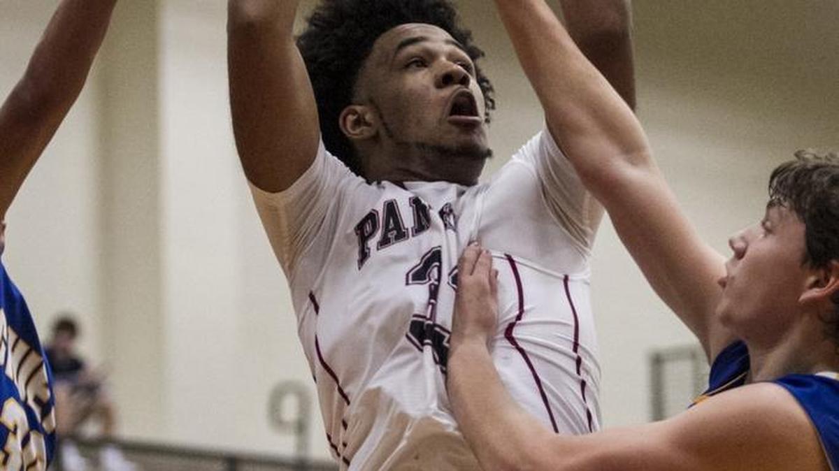 Carolina Forest’s Tariq Timmons puts up a shot against North Myrtle Beach on Tuesday night.