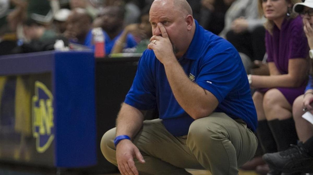 North Myrtle Beach girls basketball coach Jude Hunt looks on during a game this past season.