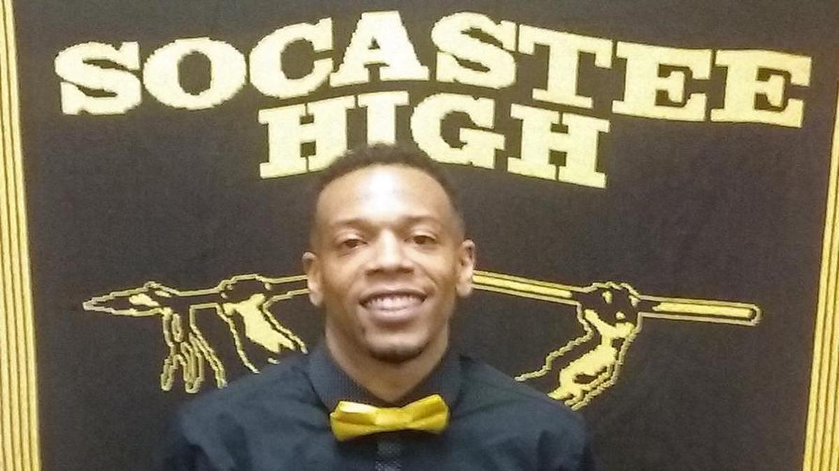 Derrick Hilton poses for a picture after being named Socastee High School’s new head boys basketball coach Tuesday.