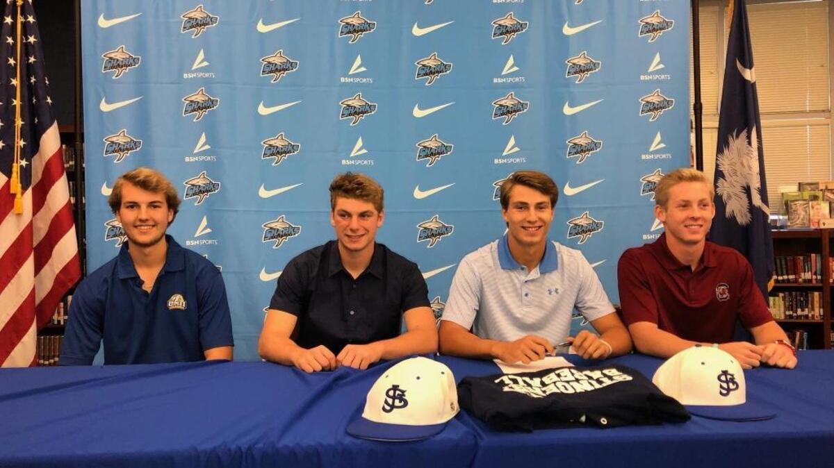 St. James baseball standouts Tyler String, Anthony Peck, Cameron Dean and Jacob English sign on with the college of their choice Wednesday during National Signing Day activities.