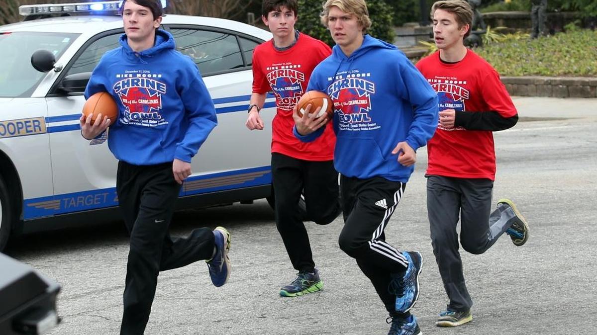 Socastee’s Keahi Mendoza (second from right) recently ran in the Mike Moore Shrine Bowl Game Ball Run.