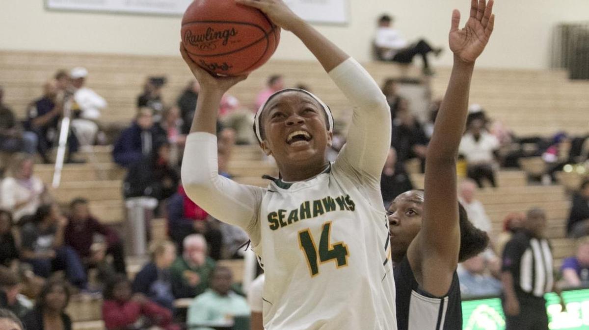 Myrtle Beach's Nia Sumpter goes up for a shot against Socastee this past season.